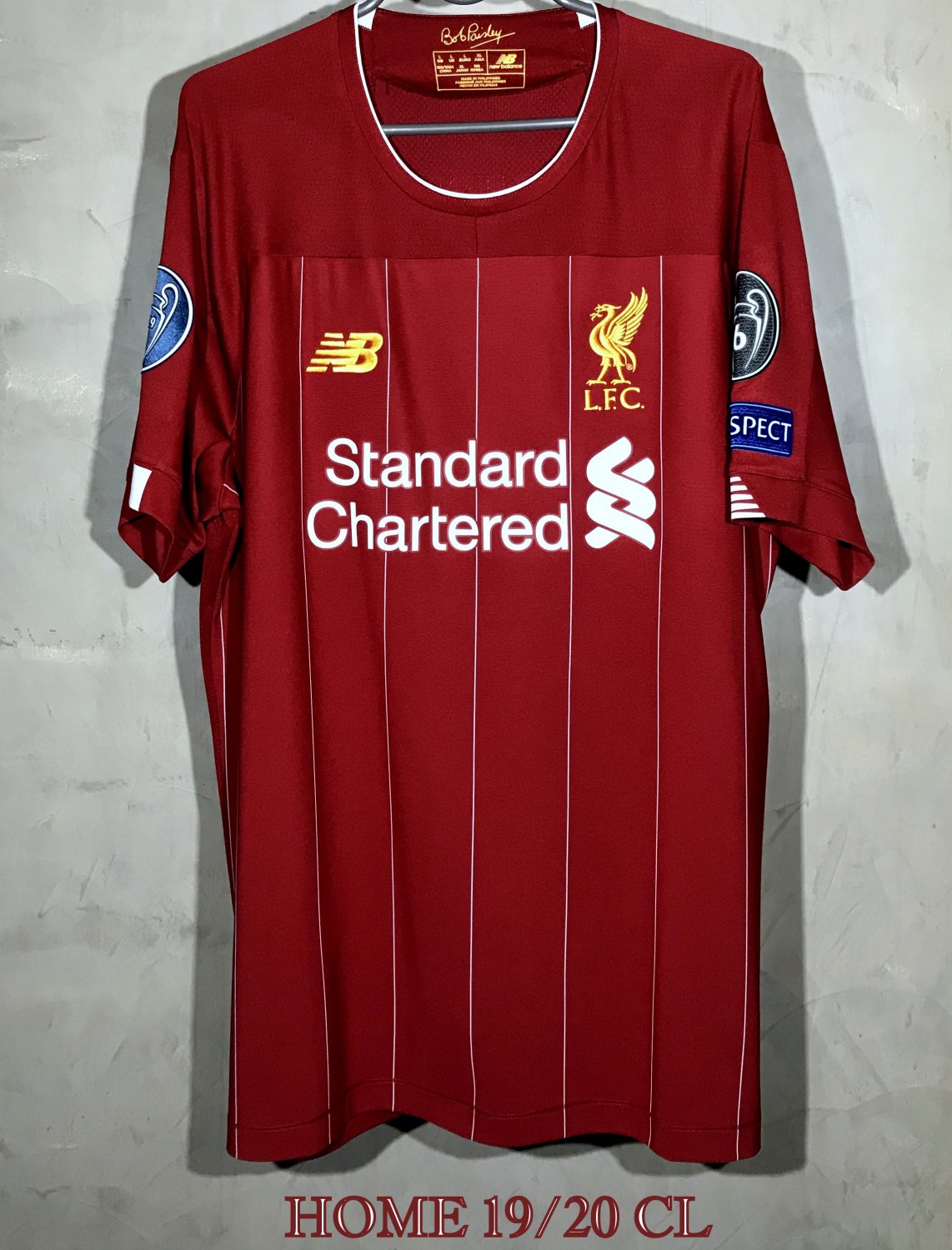 Liverpool Home football shirt 2019 - 2020. Sponsored by Standard Chartered