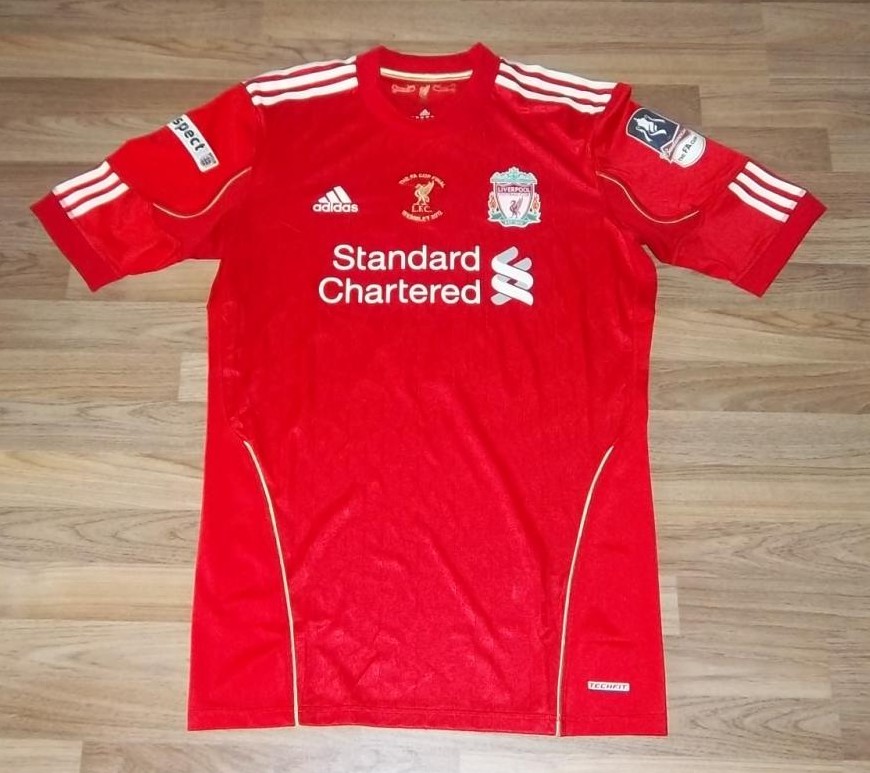 Liverpool Home football shirt 2010 - 2012. Sponsored by Standard Chartered