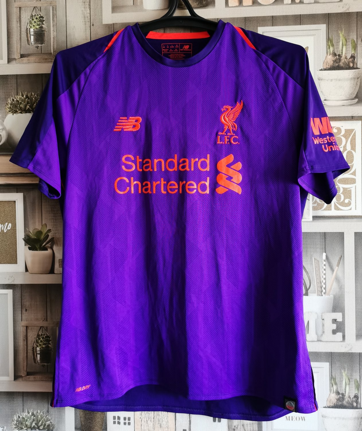 Liverpool Away football shirt 2018 - 2019. Sponsored by Standard Chartered