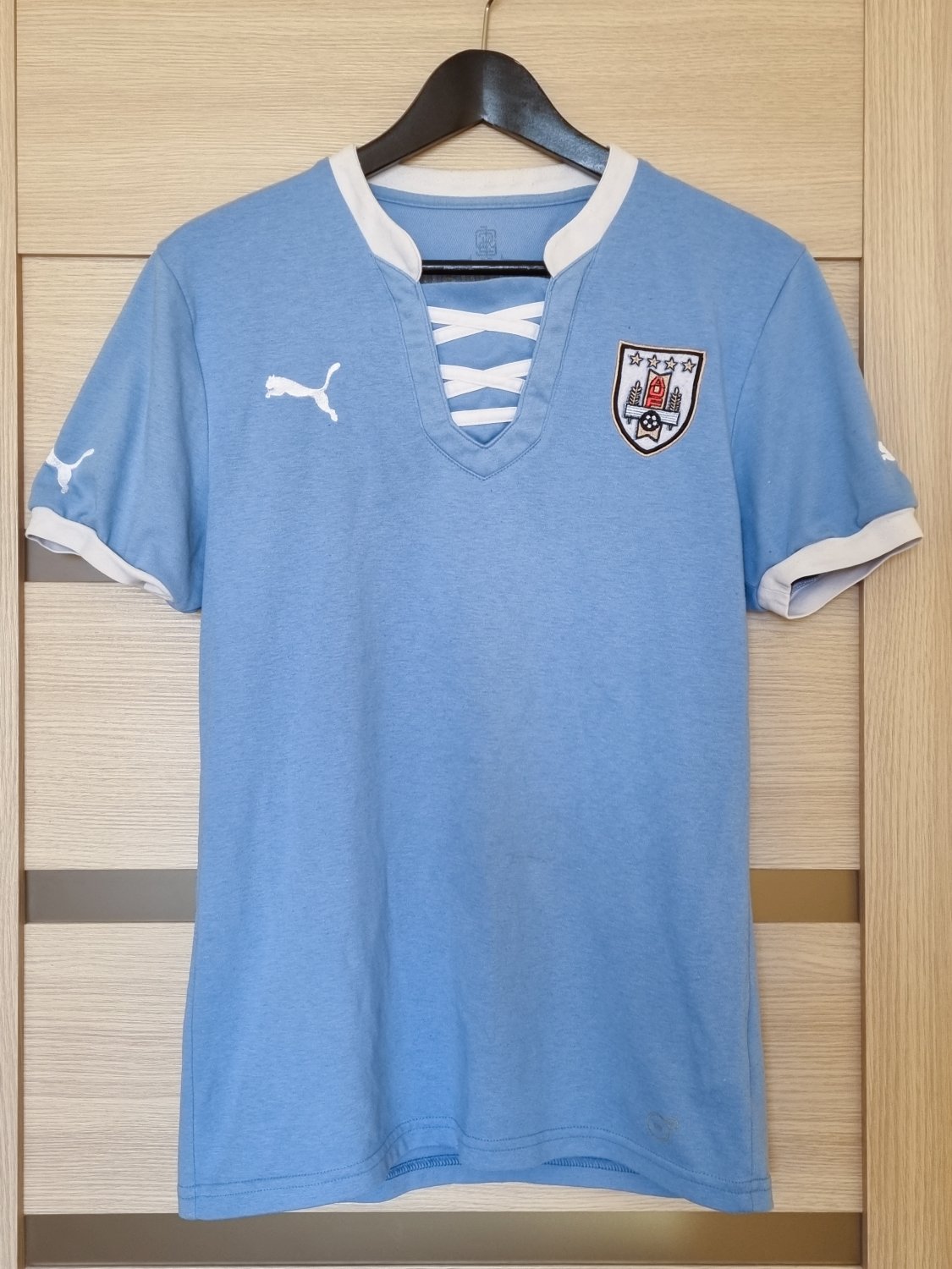 Ananiver vaso Elástico Uruguay Home Camiseta de Fútbol 2012 - 2013.