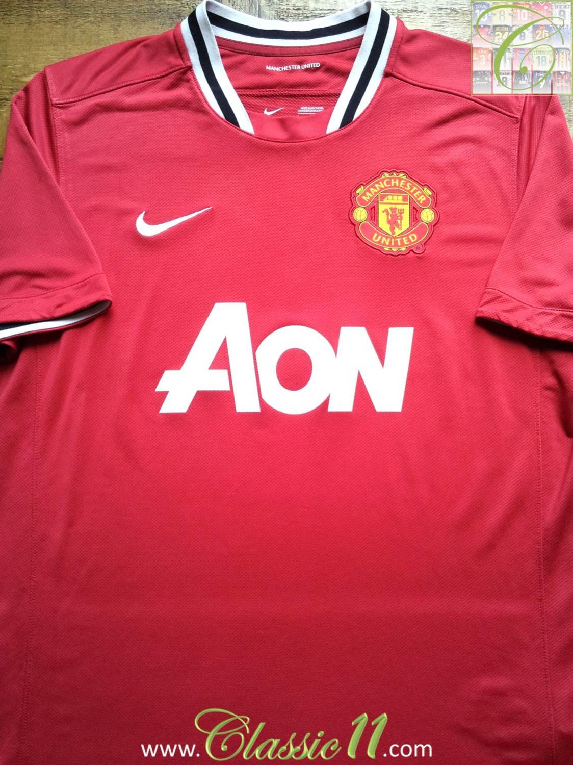 Manchester United Home football shirt 2011 - 2012. Sponsored by AON