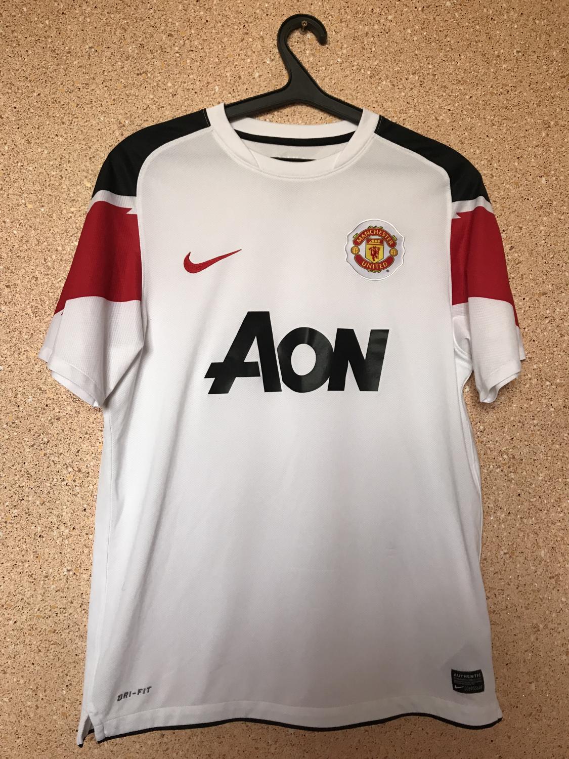 Manchester United Away football shirt 2010 - 2011. Sponsored by AON