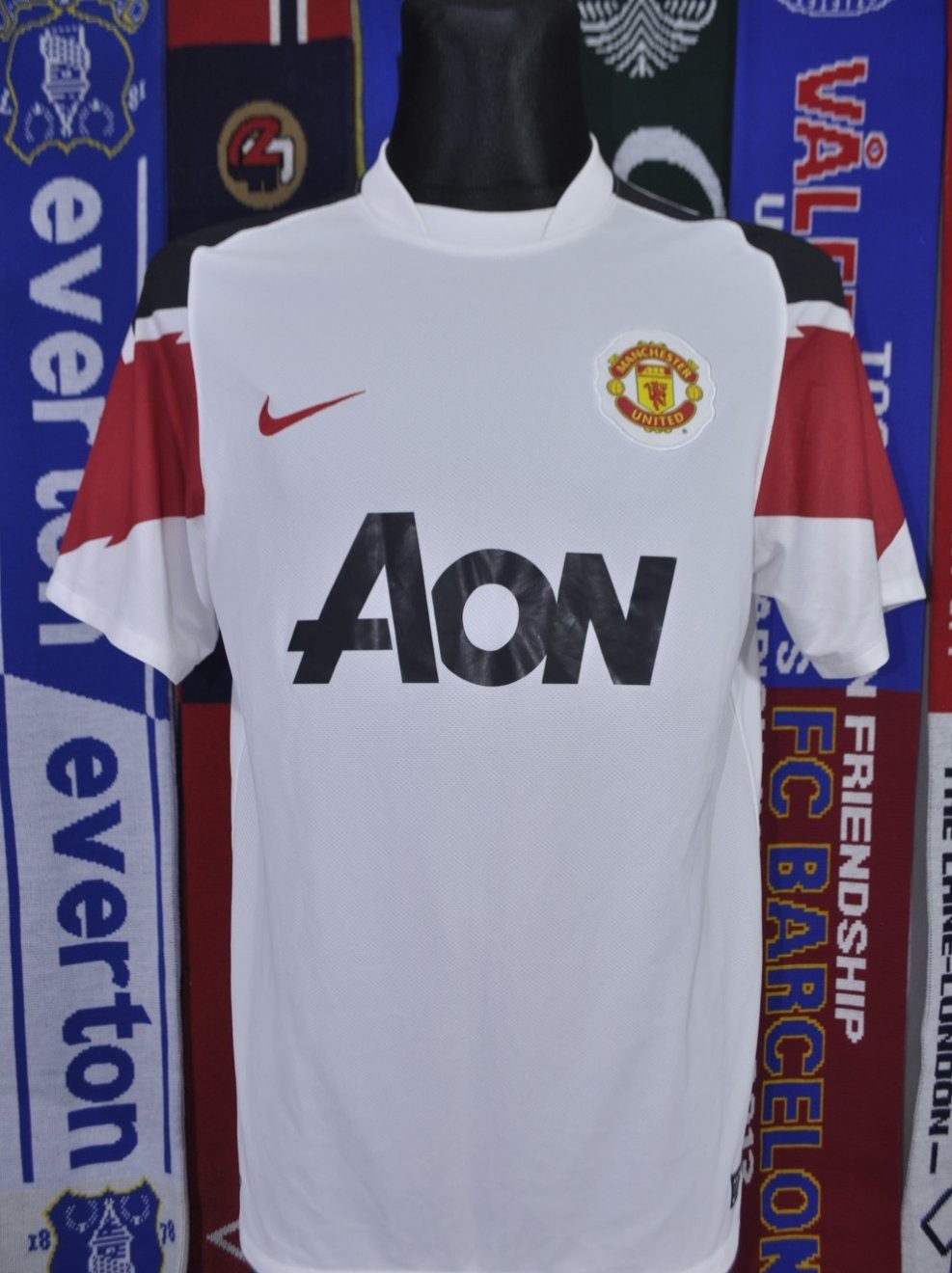 Manchester United Away football shirt 2010 - 2011. Sponsored by AON