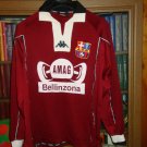 Home baju bolasepak 1999 - 2000