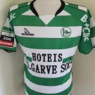 Home baju bolasepak 2010 - 2011