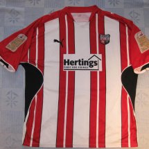 Brentford Home football shirt 2009 - 2010 sponsored by Hertings