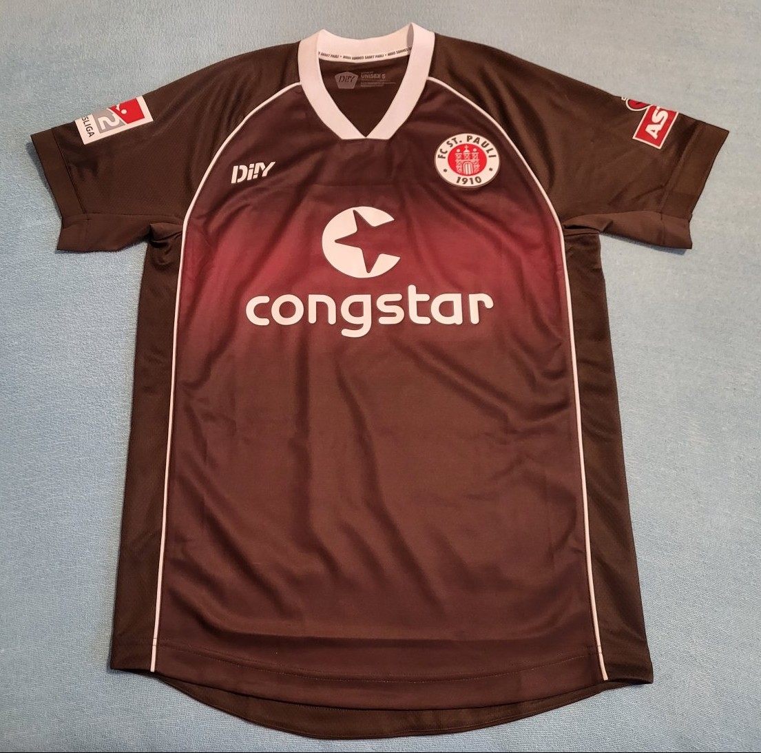 New Season St Pauli Home football shirt 2023 - 2024. Sponsored by Congstar
