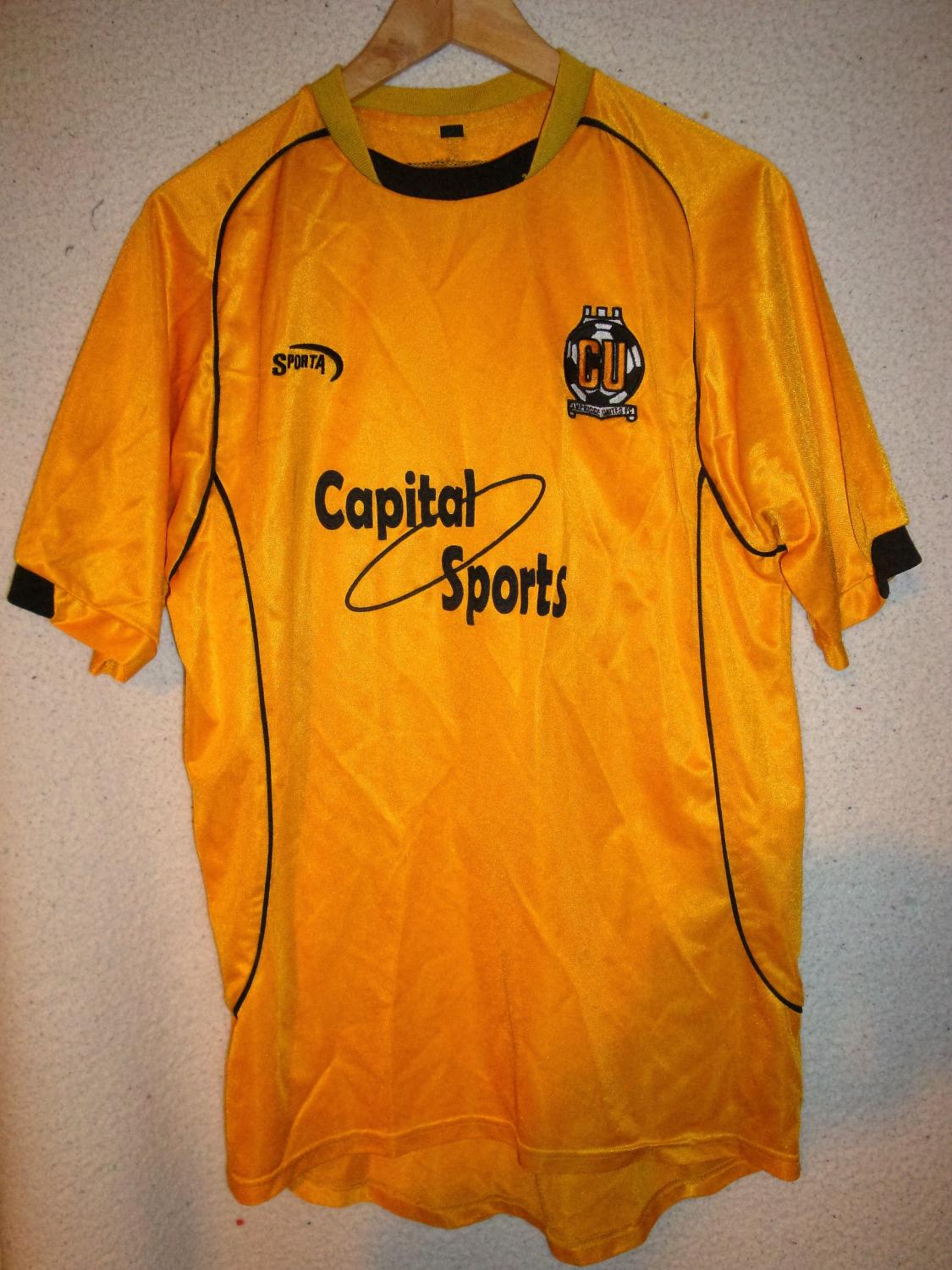 Cambridge United Home football shirt 2003 - 2005. Sponsored by Capital Sports