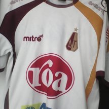 Deportes Tolima Home football shirt 2010 sponsored by Roa